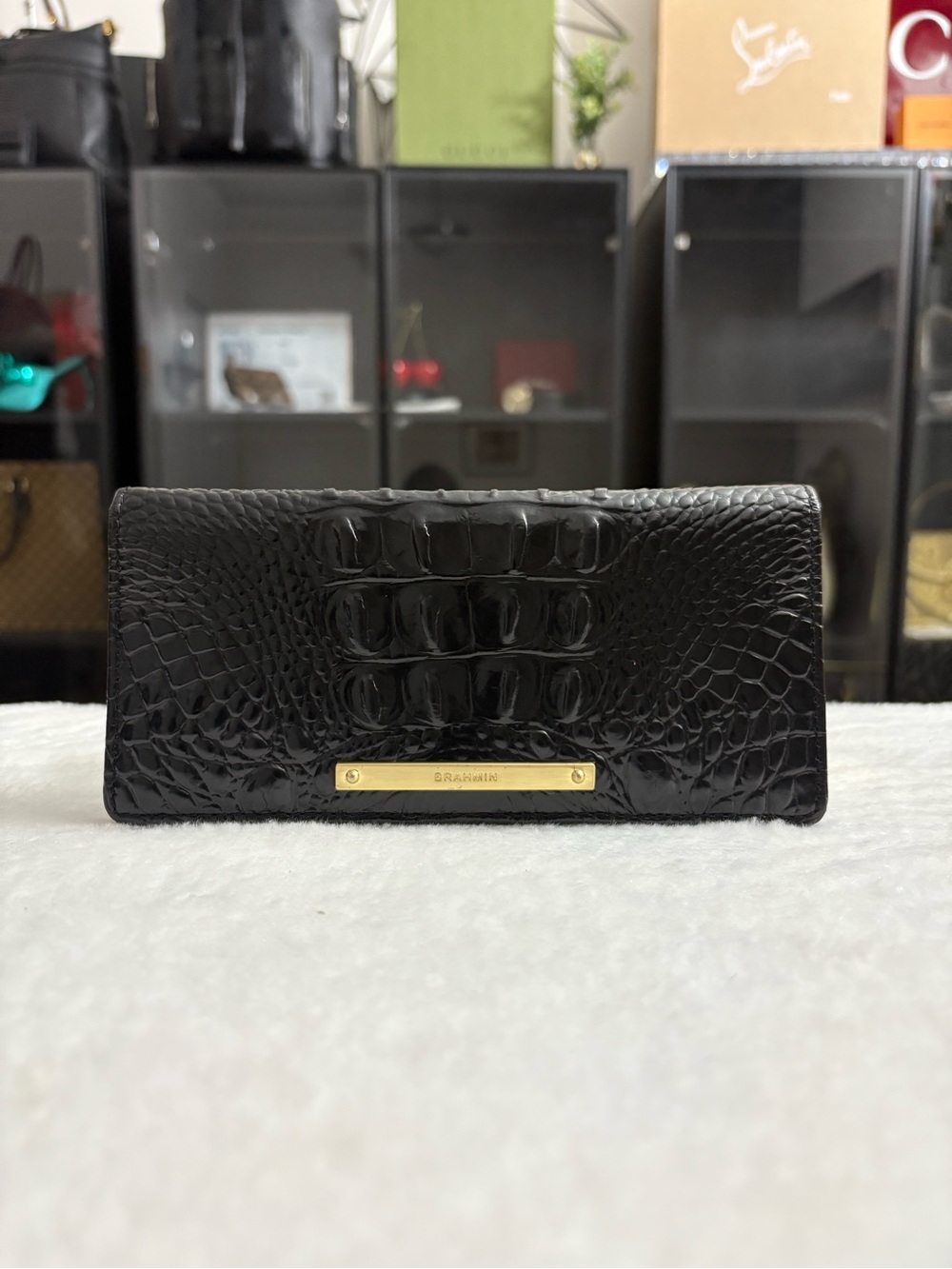 BRAHMIN ADY SIGNATURE CROCO-EMBOSSED LEATHER BIFOLD WALLET
Classic Black.